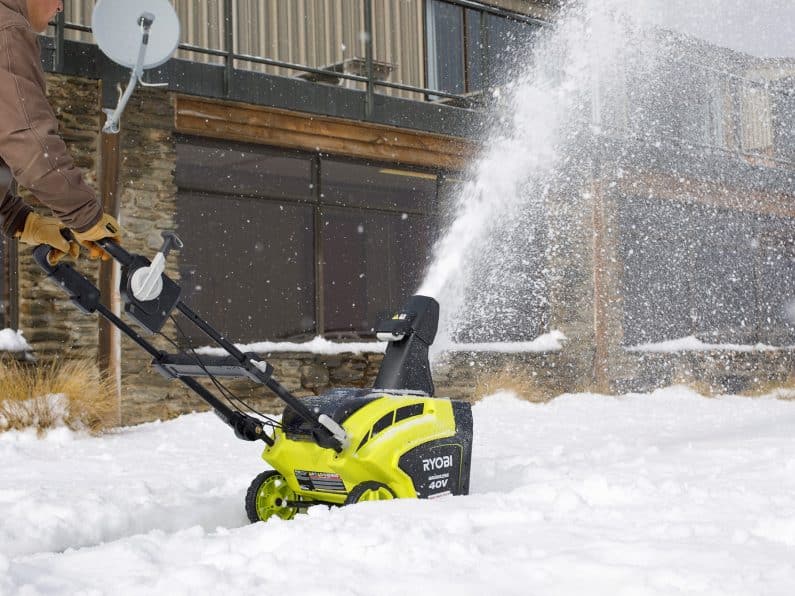 Electric Snow Blower in Driveway